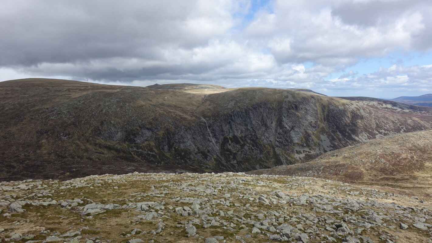 Càrn a' Choire Bhòidheach and Eagles Rock Passing clouds at Càrn a' Choire Bhòidheach, a monroe in Lochnagar