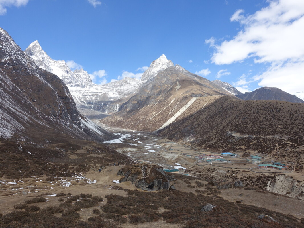 Kyajo Ri ermerges from behind the hills on the approach to Machermo Machermo and Kyajo Ri