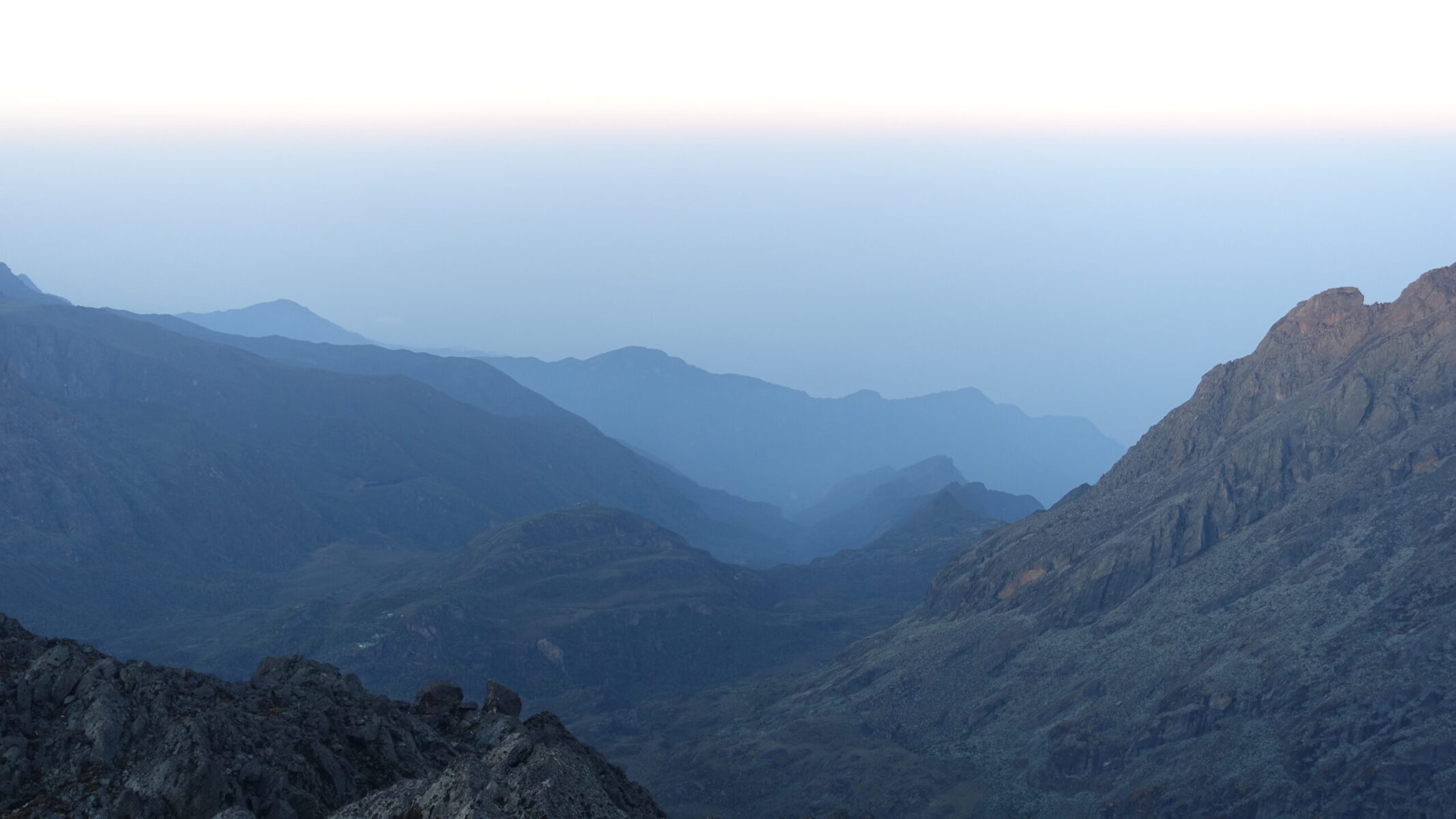 DRC shrowded in haze. Hunwick's camp visible in the lower left. Sunrise on Mount Baker