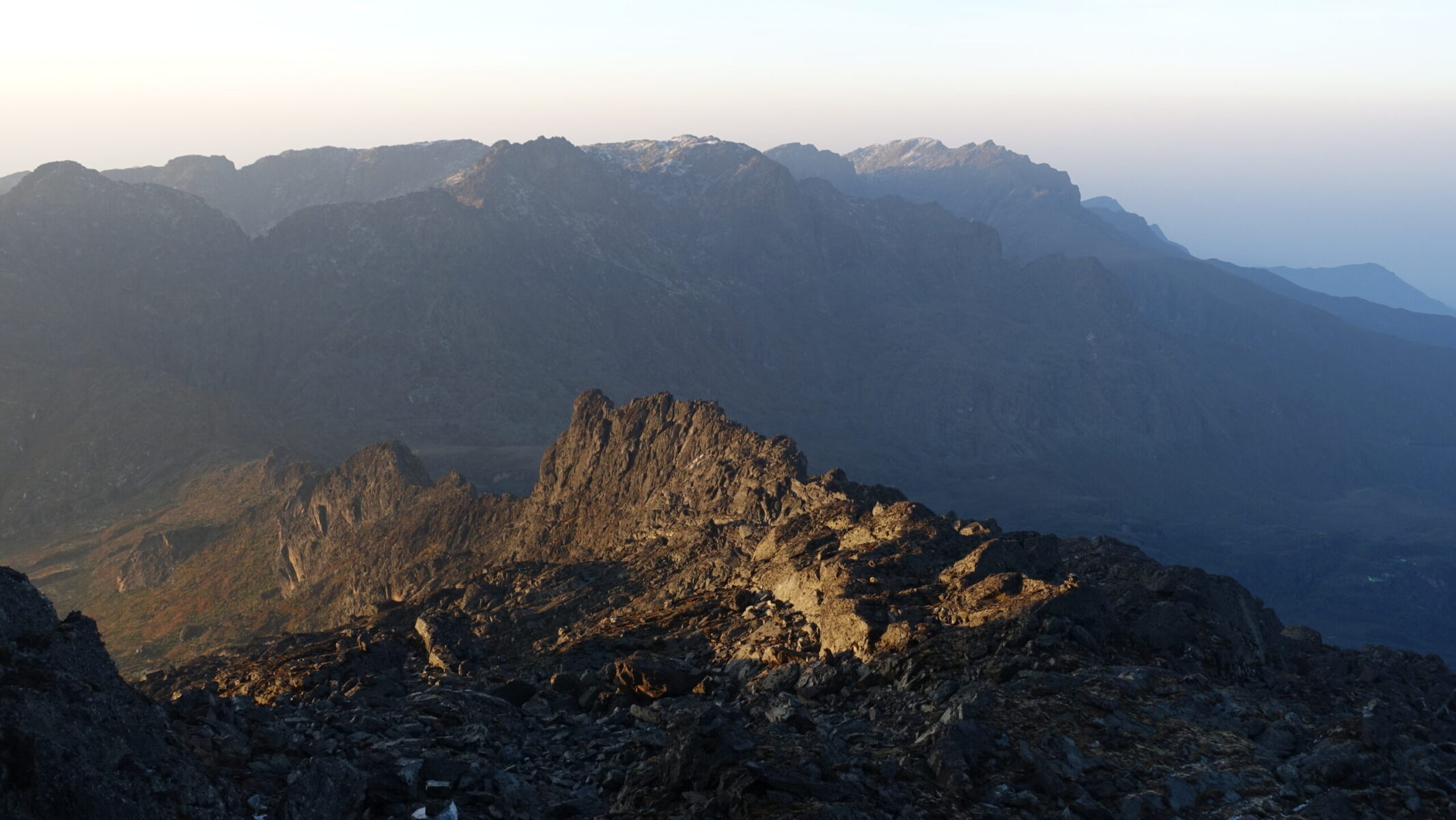 A dusting of snow from the previous afternoon's thunderstorm left on Mount Luigi di Savoia. Sunrise on Mount Baker
