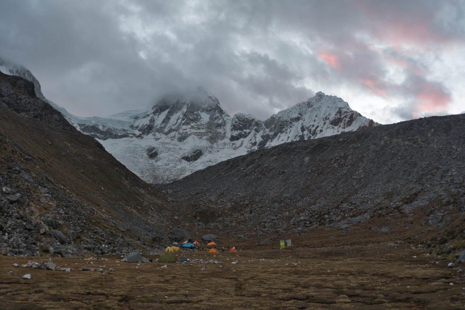 A striking sunset over Pisco/Huandoy Basecamp. My home is the yellow tents and the blue is our dining tent Pisco/Huandoy Basecamp
